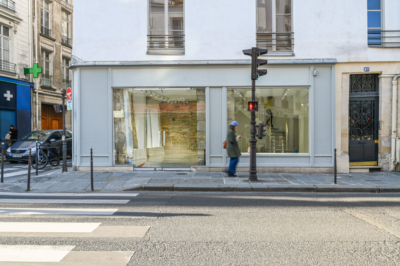 Street-facing frontage with large windows at 97 Rue de Turenne, Le Marais, Paris