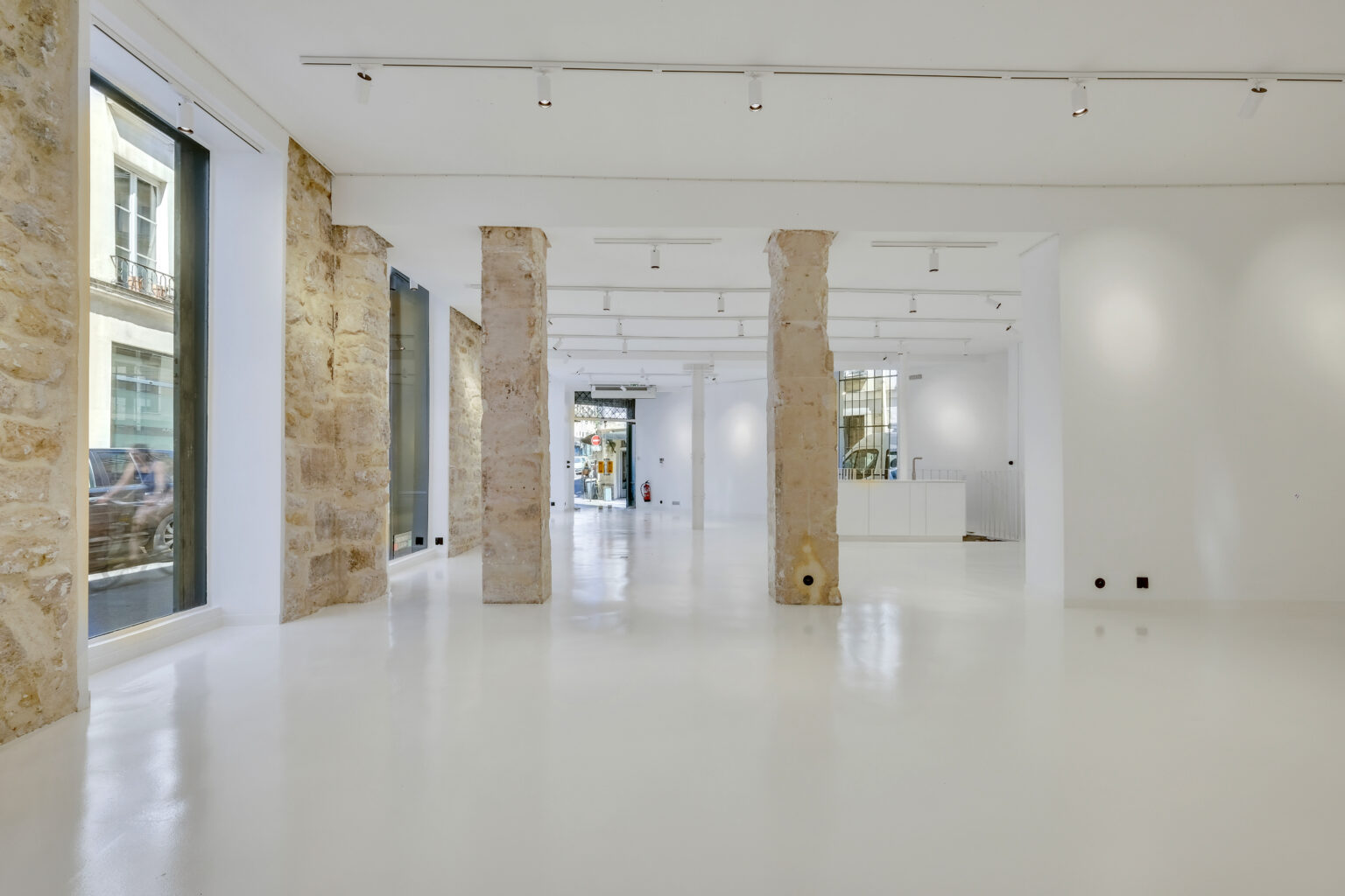 Interior perspective looking toward the entrance, 62 Rue Charlot showroom