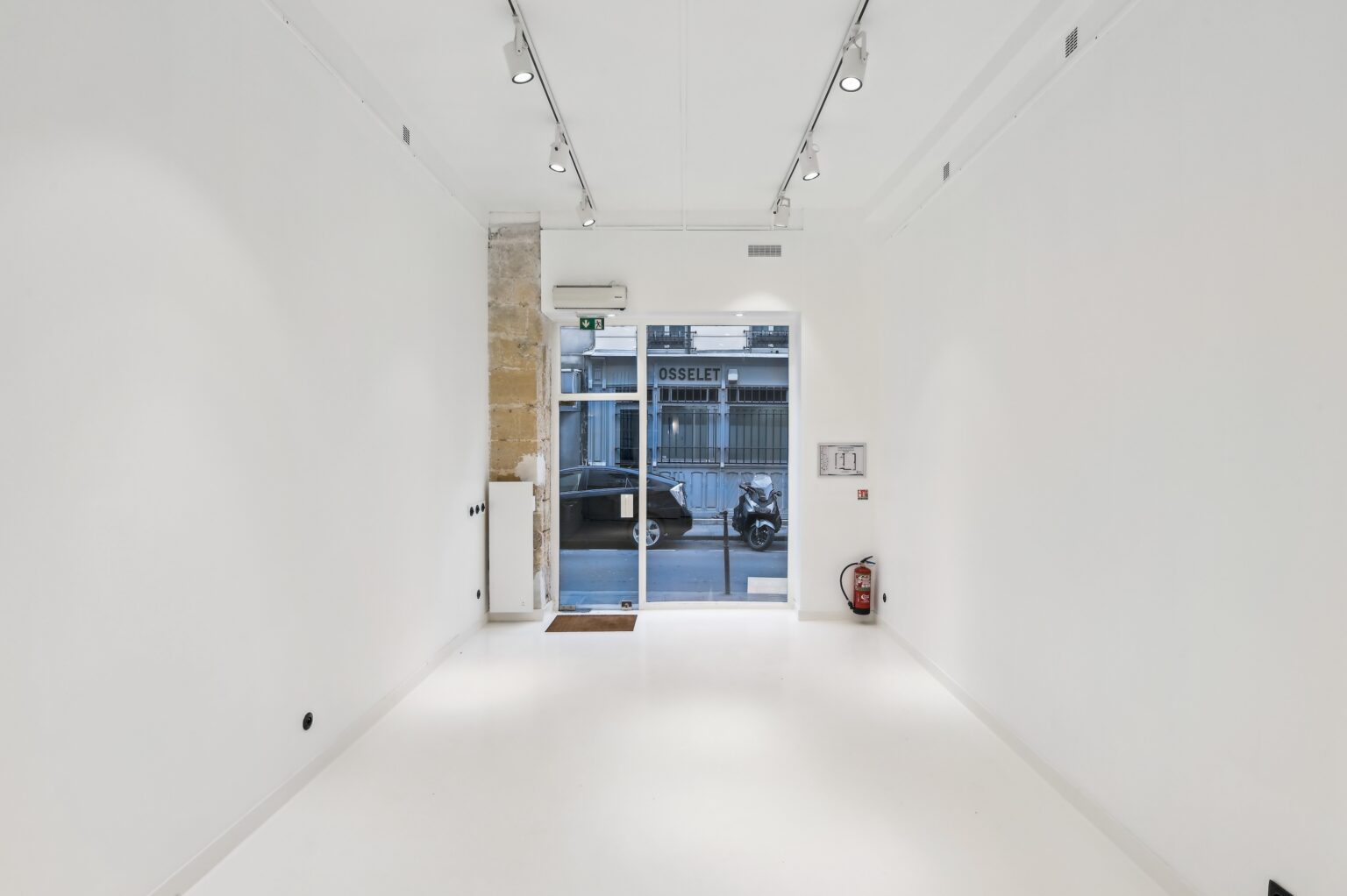 Showroom layout from storefront to back space at 52 Rue Charlot
