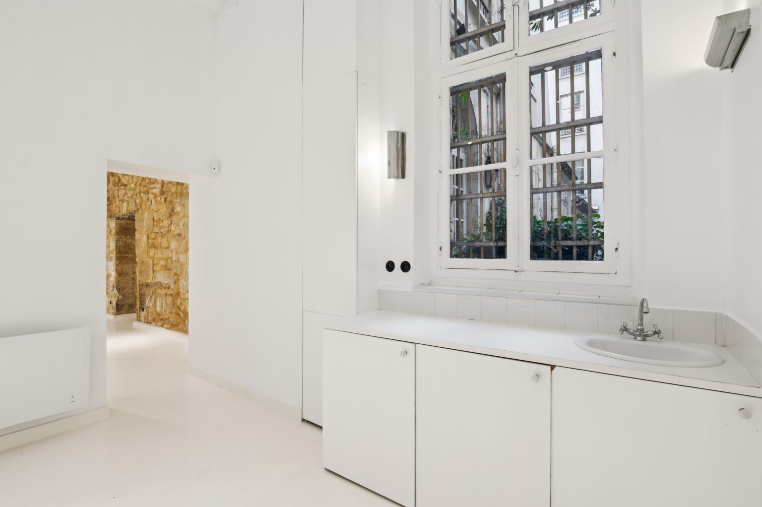 Kitchenette and service area inside 52 Rue Charlot showroom