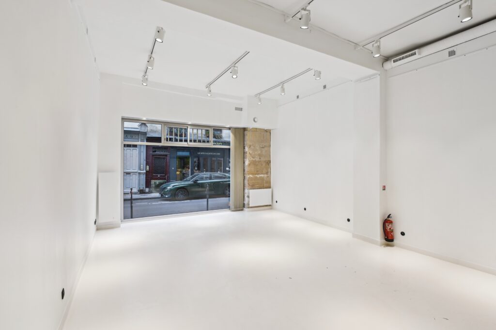 Rear showroom gallery space at 52 Rue Charlot