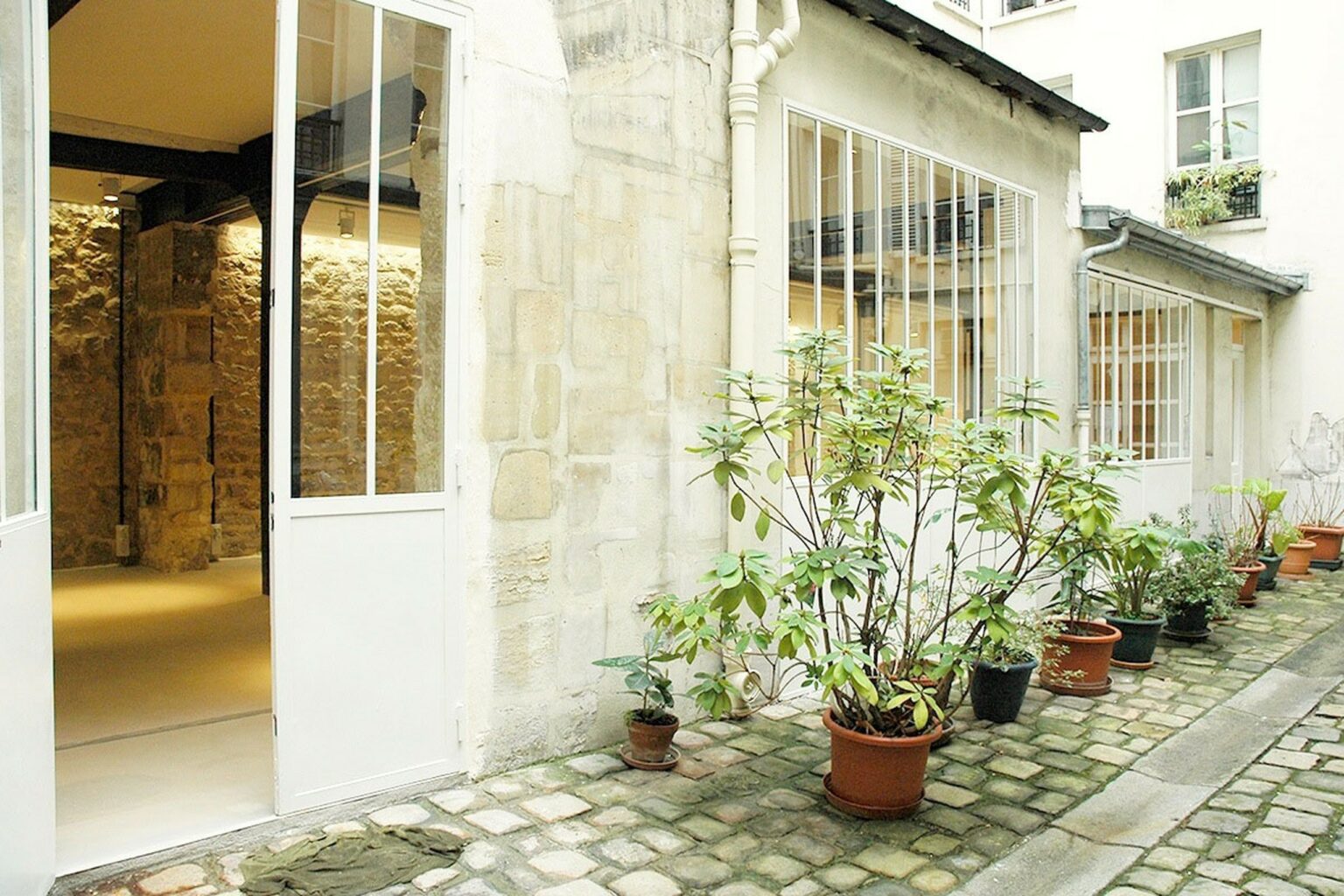 Private courtyard entrance to fashion showroom Rue Charlot Paris Marais