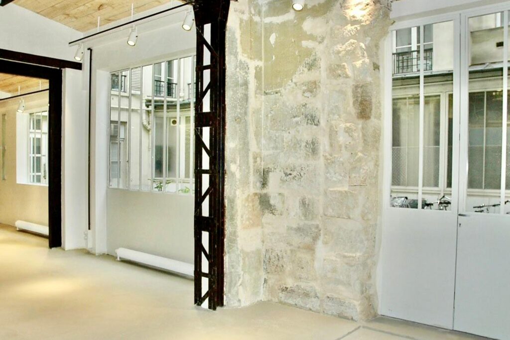 Interior access from showroom to courtyard Paris Marais