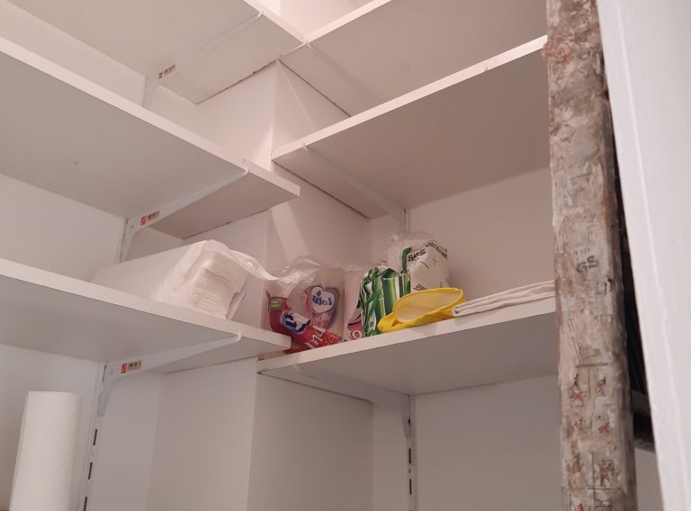 Built-in storage shelves inside 43 Rue Charlot retail space