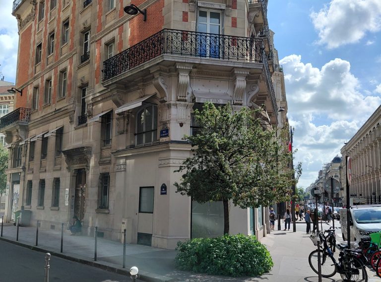 Wider corner block and street view, retail surroundings