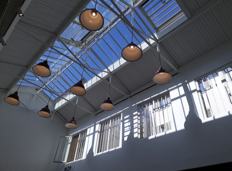 Glass-roof ceiling with lanterns at Showroom République-Valmy, Paris 11